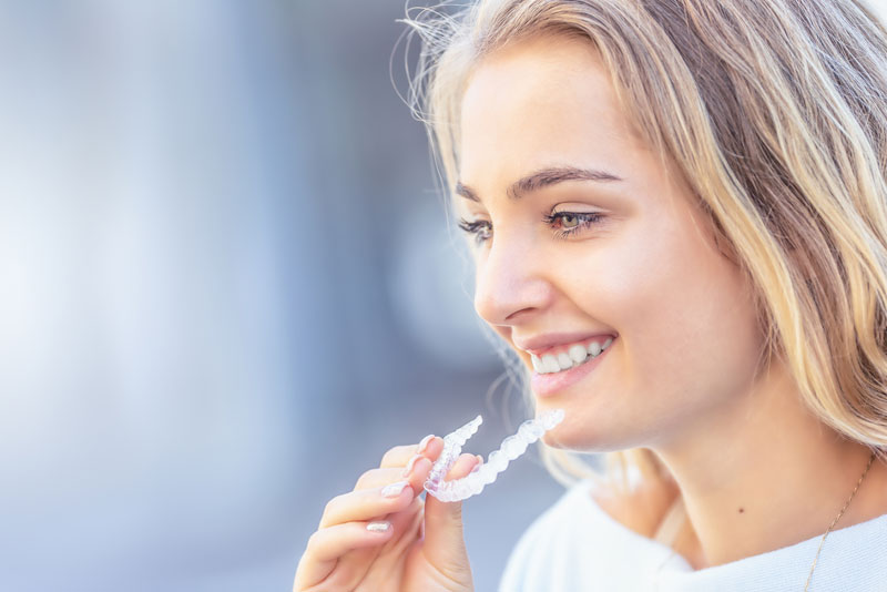 dental patient using invisalign